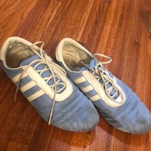 Light blue adidas sneakers. Size 9.5 women. Sold as is. See pictures.